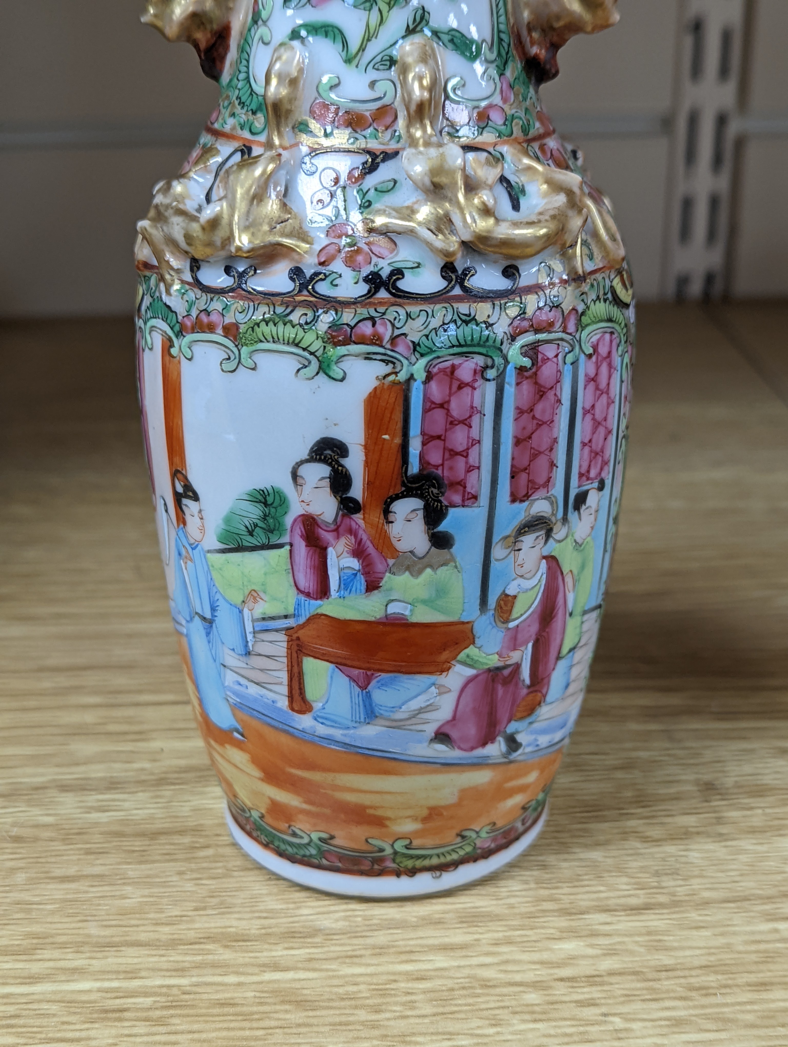 Four 19th century Chinese famille rose vases, 21cm
